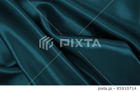 Smooth elegant blue silk or satin luxury cloth texture as abstract background. Luxurious Christmas background or New Year background design 85910714