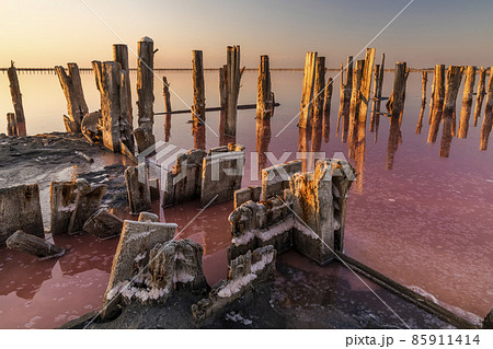 Salt on a pink salt lake at sunset. Pink Salt Lake Hutt Lagoon. Salt on a pink salt lake at sunset. Pink Salt Lake Hutt Lagoon. 85911414