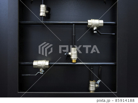 Ball valves placed on a stand. Plumbing equipment Ball valves placed on a stand. Plumbing equipment 85914188