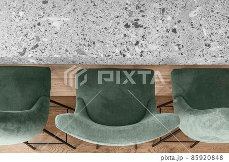 Bar counter with three bar stools and the kitchen grey stone effect countertop in minimal apartment interior Bar counter with three bar stools and the kitchen grey stone effect countertop in minimal apartment interior 85920848