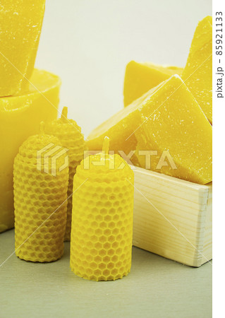 large pieces of natural beeswax, close-up, raw materials for candles. large pieces of natural beeswax, close-up, raw materials for candles. 85921133