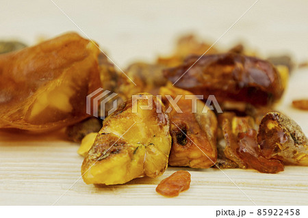 huge chunks of amber. There are many different transparent pieces of amber, small and large, huge chunks of amber. There are many different transparent pieces of amber, small and large, 85922458