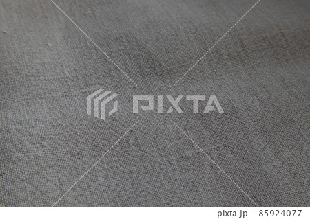 Natural linen texture as a background, natural color. Natural linen texture as a background, natural color. 85924077