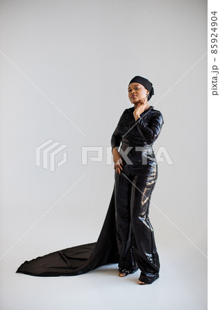 African islamic woman in black evening wear posing indoors 85924904
