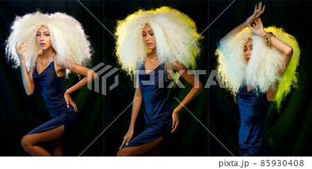 Fashion Beauty Woman has blonde afro hair looks at camera and express feeling smile happy 85930408