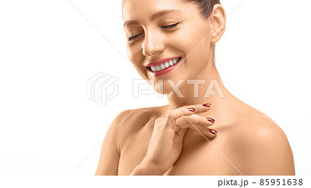 Close-up portrait of a 40 years old woman with closed eyes touching her skin. Skin care concept. Close-up portrait of a 40 years old woman with closed eyes touching her skin. Skin care concept. 85951638