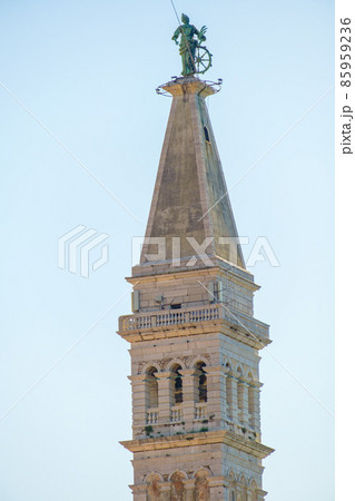 The Tower of The Church of St. Euphemia on the background of blue sky in Rovinj, Croatia.  85959236