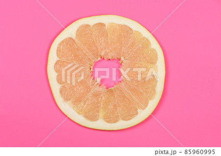 Perfectly retouched pomelo on pink background. 85960995