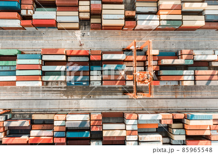 Aerial view of shipping container port terminal. Colourful pattern of containers in harbor. Maritime logistics global inport export trade transportation. 85965548