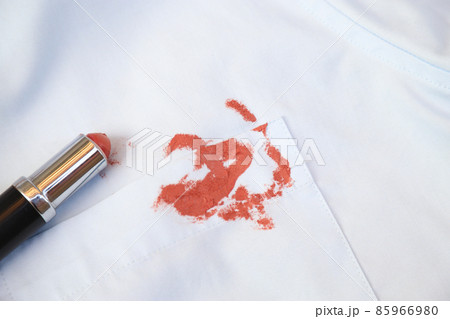 dirty lipstick stain on cloth from daily life activity for cleaning concept. housework care living life of people dirty lipstick stain on cloth from daily life activity for cleaning concept. housework care living life of people 85966980