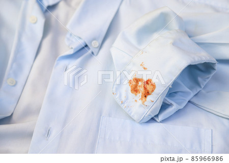 dirty barbeque sauce stain on cloth from daily life activity for cleaning concept. housework care living life of people dirty barbeque sauce stain on cloth from daily life activity for cleaning concept. housework care living life of people 85966986