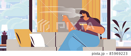 woman smoking cigarette bad habits unhealthy lifestyle nicotine addiction no smoking concept living room interior 85969223