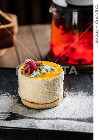 Sweet gourmet passion fruit cheesecake dessert 85977881