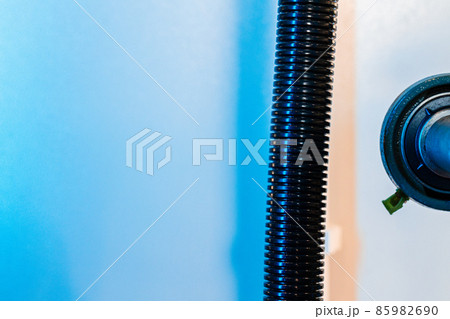Close up of a plastic corrugated hosepipe in industrial factory Close up of a plastic corrugated hosepipe in industrial factory 85982690