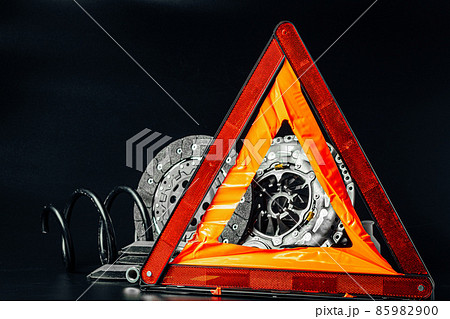 Close up of new car parts on black background Close up of new car parts on black background 85982900