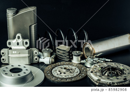 Close up of new car parts on black background Close up of new car parts on black background 85982908