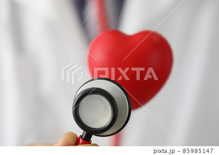 Medical stethoscope instrument listen to red plastic heart Medical stethoscope instrument listen to red plastic heart 85985147