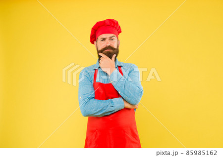 Chef in red uniform restaurant cook readily providing dish Chef in red uniform restaurant cook readily providing dish 85985162