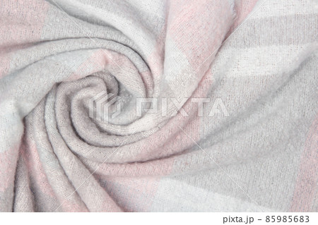 Warm woolen plaid close-up. Abstract textile background or texture. Winter cozy background for cold weather 85985683