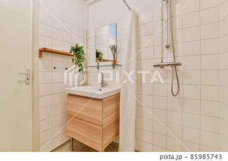 A delightful bathroom in a minimalist style in daylight 85985743
