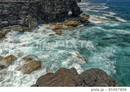 pico island waves on lava cliffs landscape 85987806