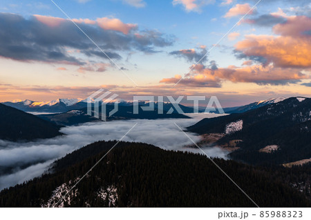 Morning haze in the mountains, picturesque landscapes at sunrise in the mountains and forests. Morning haze in the mountains, picturesque landscapes at sunrise in the mountains and forests. 85988323