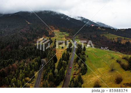 Ukrainian roads in the mountains, serpentines from roads and forests, views of the mountains and the road. 85988374
