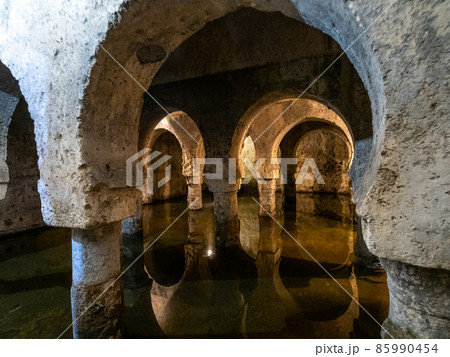 Moorish cistern Aljibe in Caceres. Former mosque under the Muslim rule in Spain. 85990454