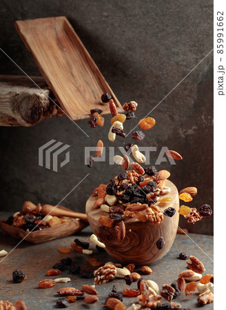 Falling dish with nuts and raisins. Falling dish with nuts and raisins. 85991662