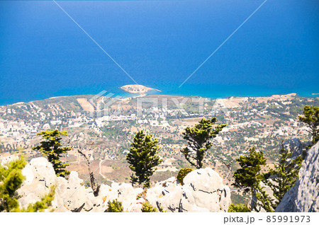 Watercolor drawing of View of Kyrenia Girne town and Mediterranean sea from ruins of medieval Saint Hilarion Castle 85991973