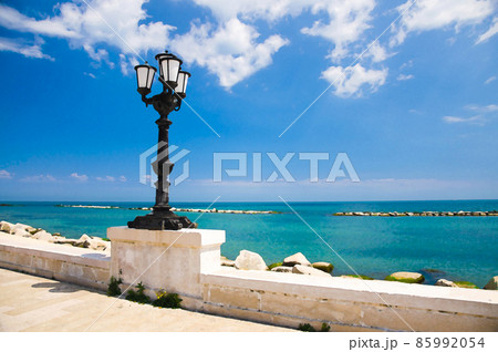 Watercolor drawing of embankment promenade Imperatore Augusto with street light and view of Adriatic sea in Bari city Watercolor drawing of embankment promenade Imperatore Augusto with street light and view of Adriatic sea in Bari city 85992054