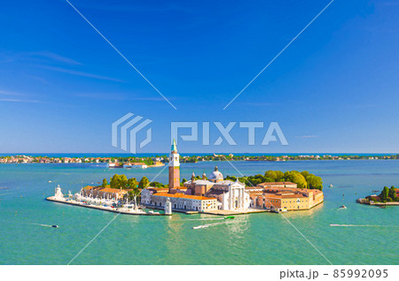 Watercolor drawing of Aerial panoramic view of San Giorgio Maggiore island with Campanile San Giorgio in Venetian Lagoon, sailing boats in Giudecca Canal 85992095