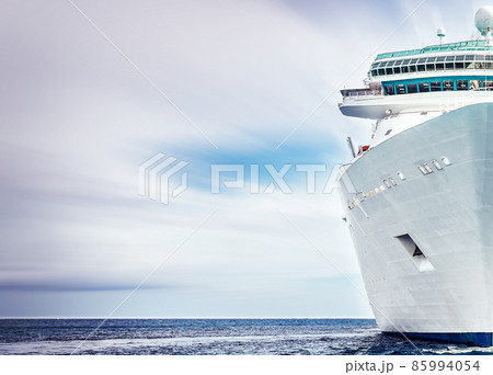 White cruise ship with motion blurred sky 85994054