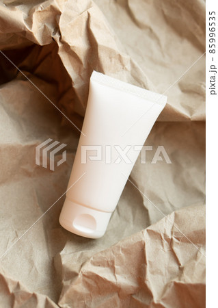 White tube of cream mock-up, design ready cosmetic and care product packaging White tube of cream mock-up, design ready cosmetic and care product packaging 85996535