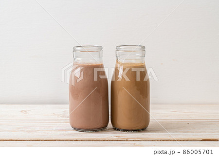 chocolate milk and coffee with milk in bottle chocolate milk and coffee with milk in bottle 86005701