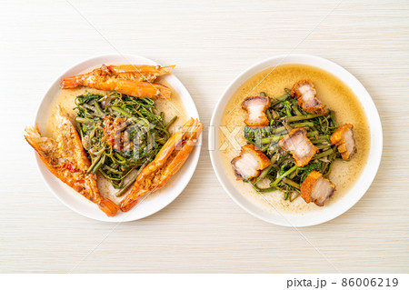 Stir-fried water mimosa with crispy pork belly and river prawns Stir-fried water mimosa with crispy pork belly and river prawns 86006219