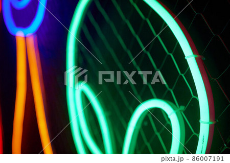 Abstact red neon sign with a blue neon tube. 86007191