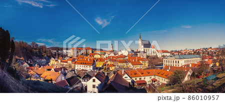 Cesky Krumlov, Czech republic - 03 20 2020: Cityscape panorama with st. Vitus Church and Castle 86010957