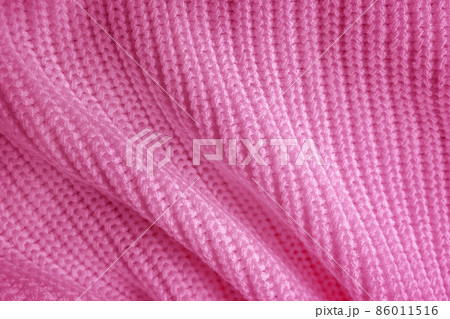 Soft knitted sweater texture closeup. Abstract light violet pink background. The trendy backdrop for web design. Luxury fabric backplate pattern Soft knitted sweater texture closeup. Abstract light violet pink background. The trendy backdrop for web design. Luxury fabric backplate pattern 86011516