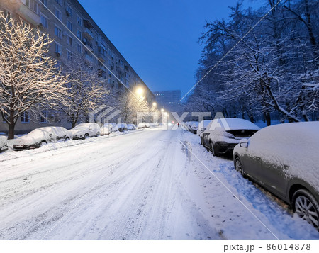 Early morning in the city after snowfall and blizzard.  86014878