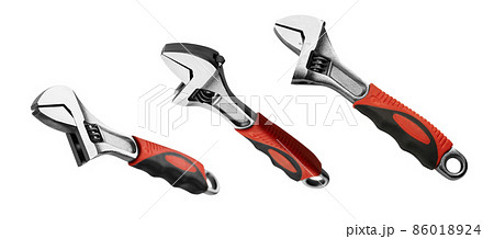 Adjustable wrench in different angles on a white background 86018924
