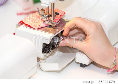 using sewing machine 86021674