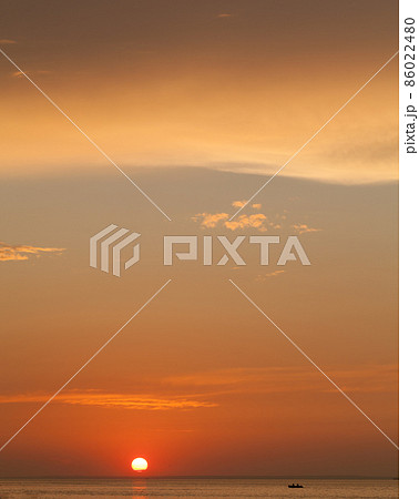 Colorful sunset sky over Baltic Sea in a summer evening Colorful sunset sky over Baltic Sea in a summer evening 86022480