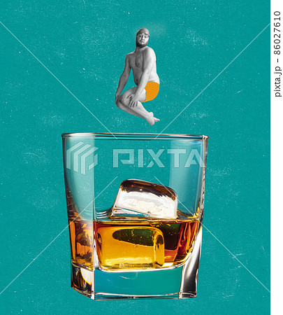Funny man jumping into glass of whiskey... - Stock Photo [86027610] - PIXTA