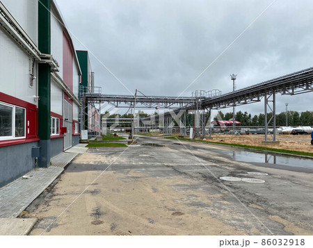 Refinery - chemical factory at night with buildings, pipelines and lighting - industrial plant Refinery - chemical factory at night with buildings, pipelines and lighting - industrial plant 86032918