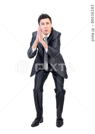 Hopeless man in suit praying for help 86036283