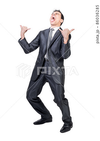 Crazy businessman yelling loud and showing rock and roll gesture 86036285