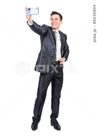 Positive businessman taking selfie on white background 86036804