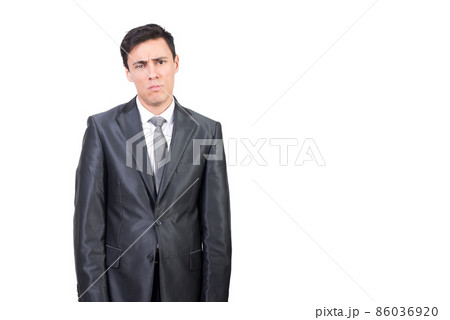 Sad man in elegant suit looking at camera 86036920