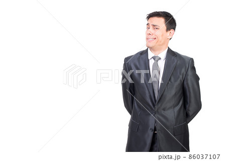 Arrogant man in elegant suit in studio 86037107